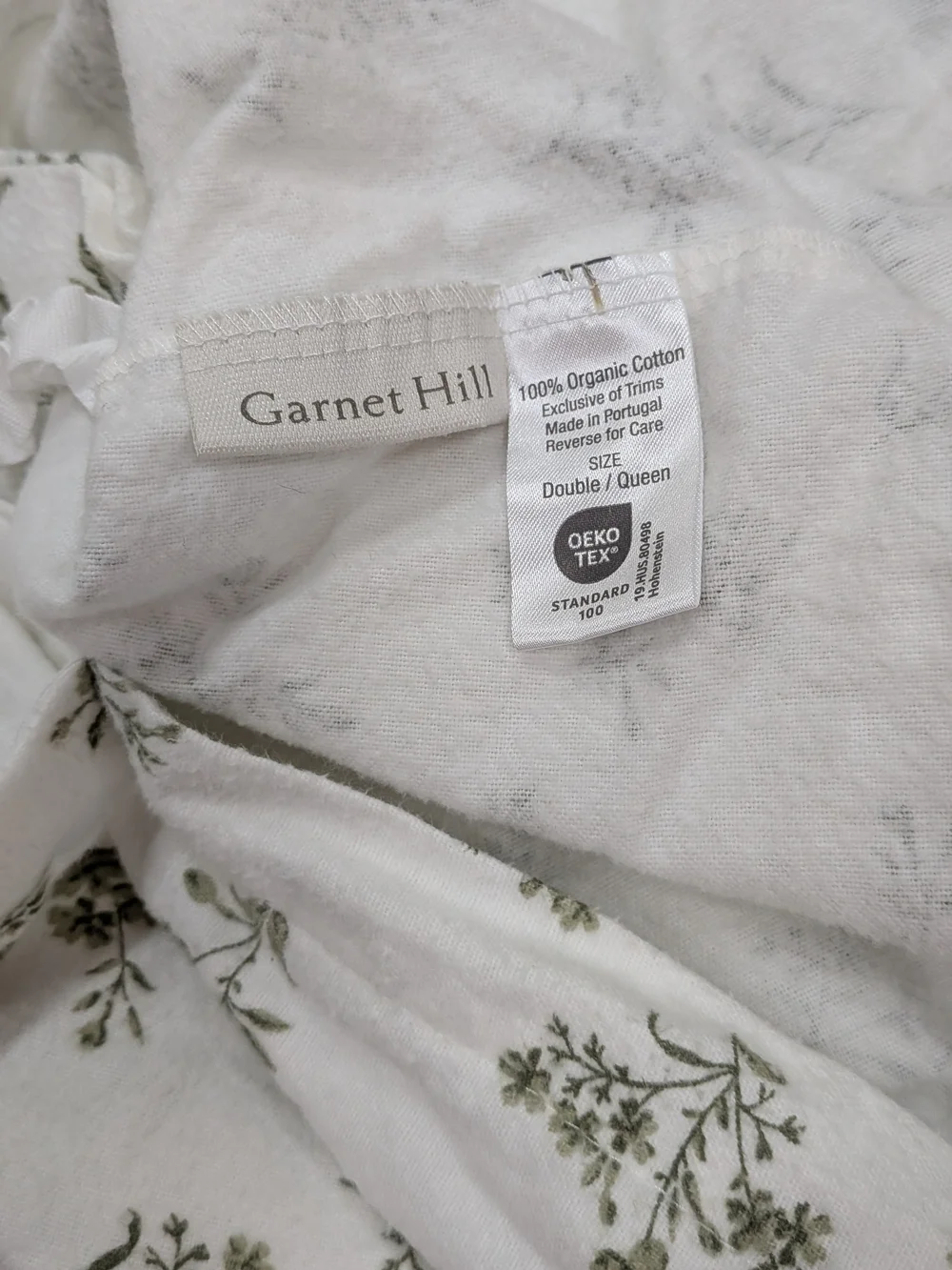 Garnet Hill Cream Duvet Cover with Green Floral Print.